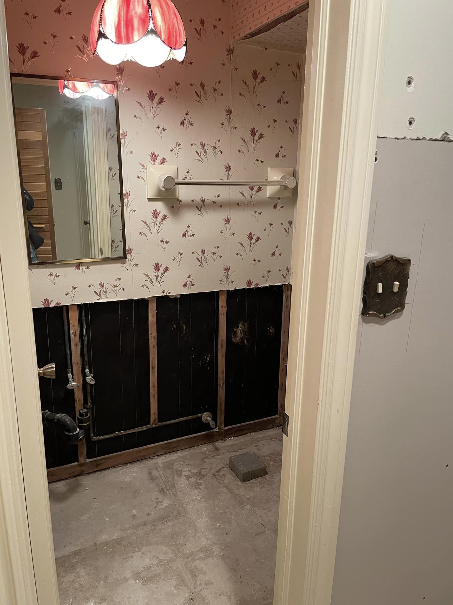 North York basement bathroom two before renovation, dated and unfinished